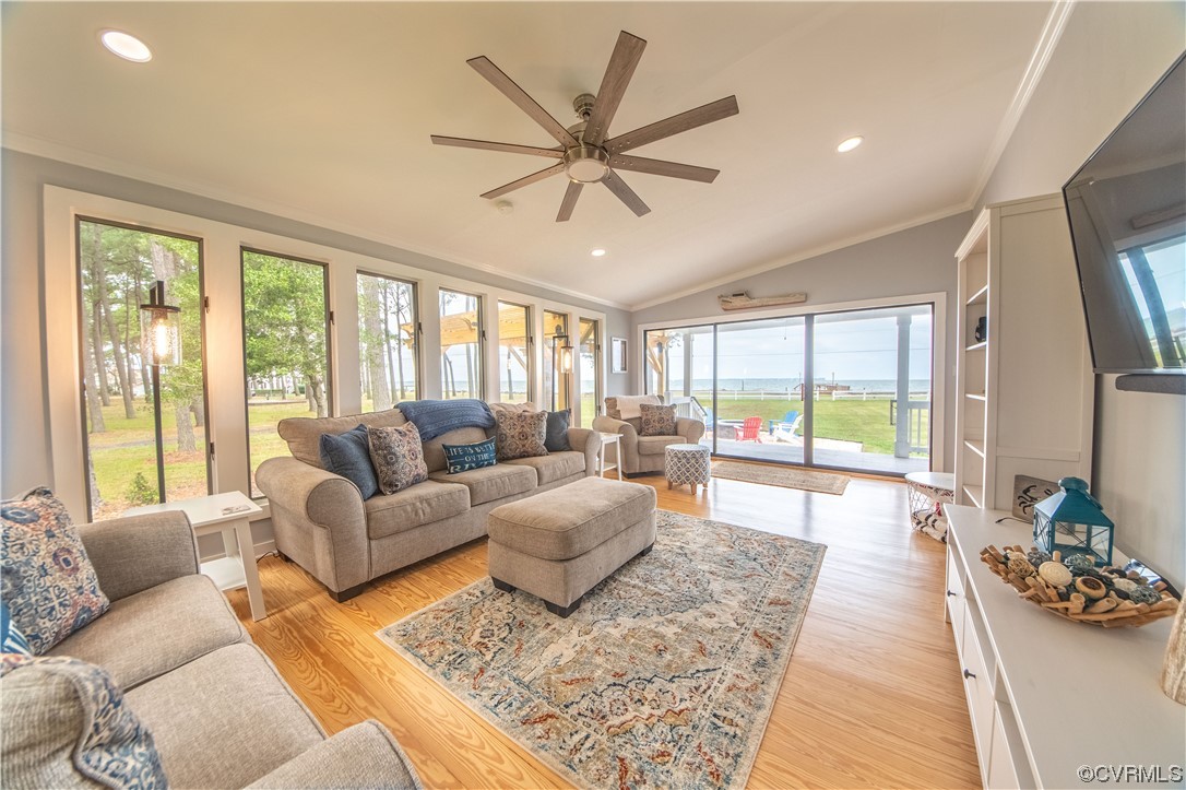 215 Riverside Drive Deltaville, VA 23043 - Photo 7 of 49 a living room with furniture and a large window