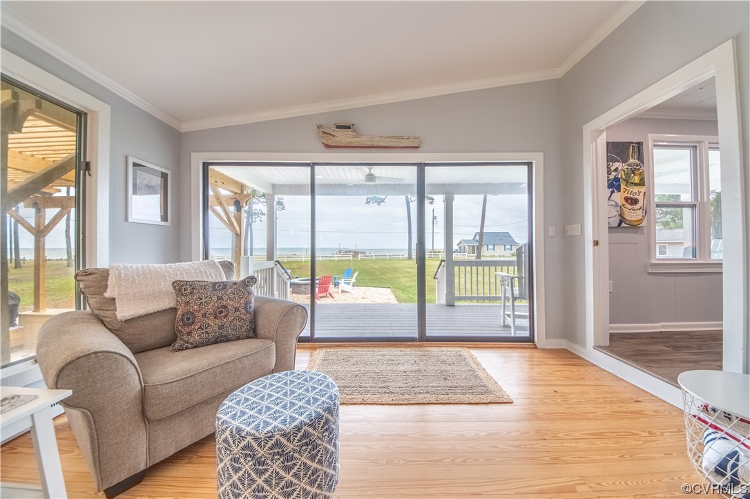 215 Riverside Drive Deltaville, VA 23043 - Photo 10 of 49 a living room with furniture and a large window