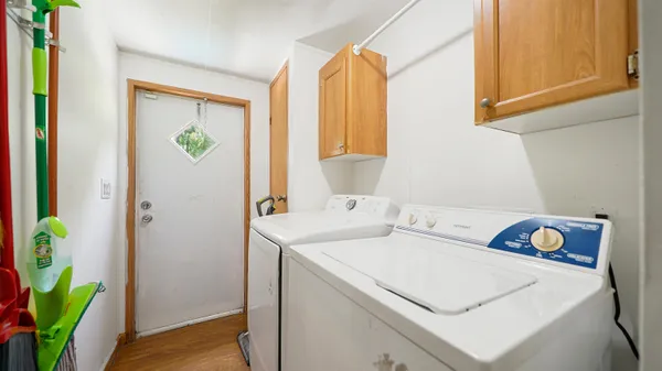 a utility room with dryer and washer