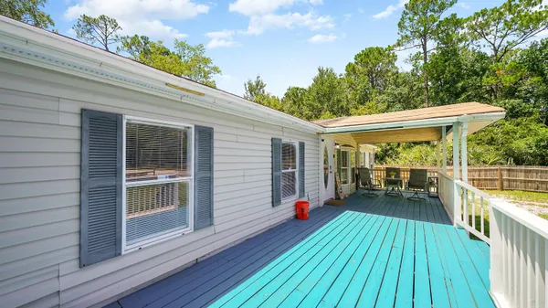 a view of a house with a roof deck