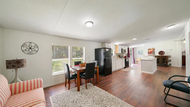 a living room with furniture and a table