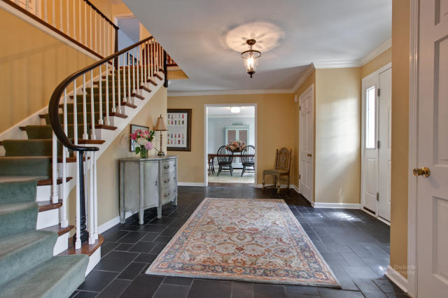 92 Old Mill Court Barrington, IL 60010 - Photo 2 of 25 wooden floor with an entryway and livingroom view