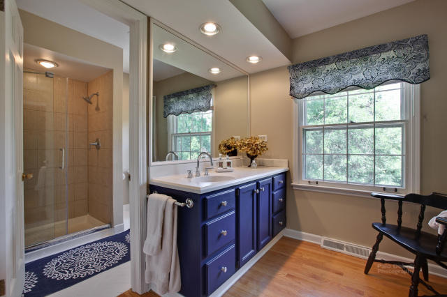 92 Old Mill Court Barrington, IL 60010 - Photo 13 of 25 a bathroom with a granite countertop sink and a mirror