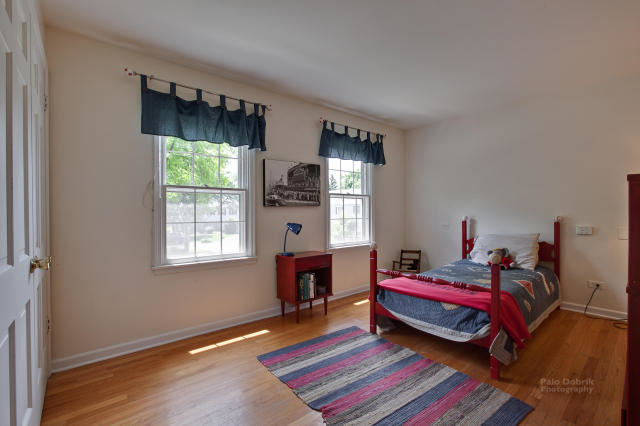 92 Old Mill Court Barrington, IL 60010 - Photo 15 of 25 a room with a bed and a window
