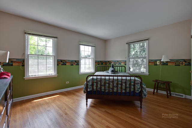 92 Old Mill Court Barrington, IL 60010 - Photo 17 of 25 a bedroom with a bed and a window