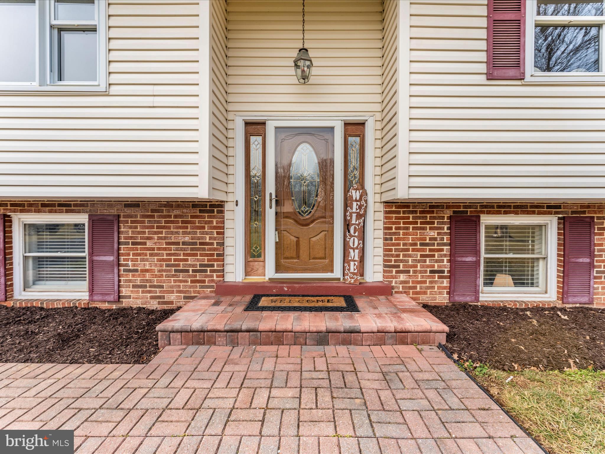 4328 Dover Drive Frederick, MD 21703 - Photo 2 of 54 a front view of a house with a yard