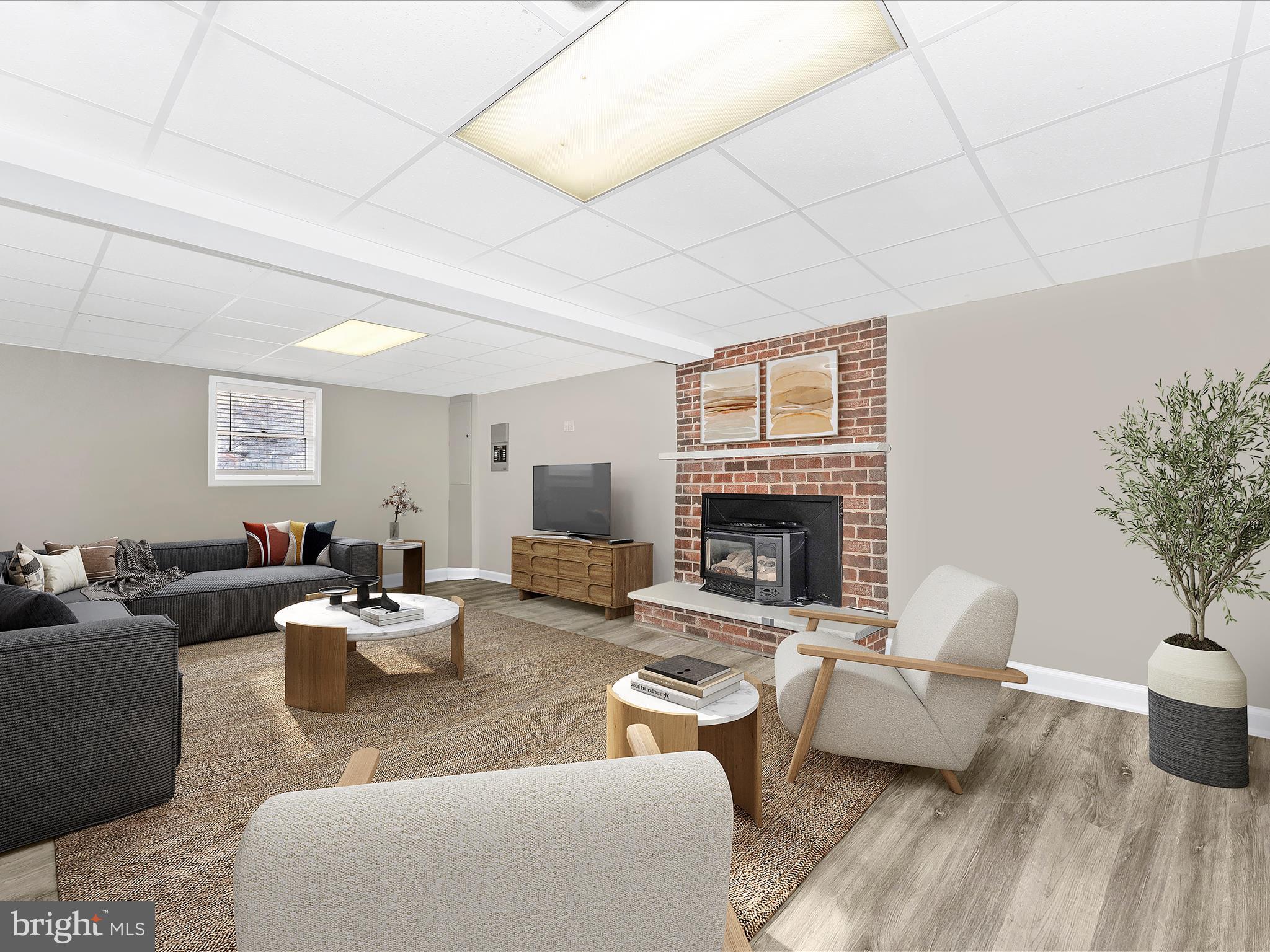 4328 Dover Drive Frederick, MD 21703 - Photo 26 of 54 a living room with furniture and a fireplace