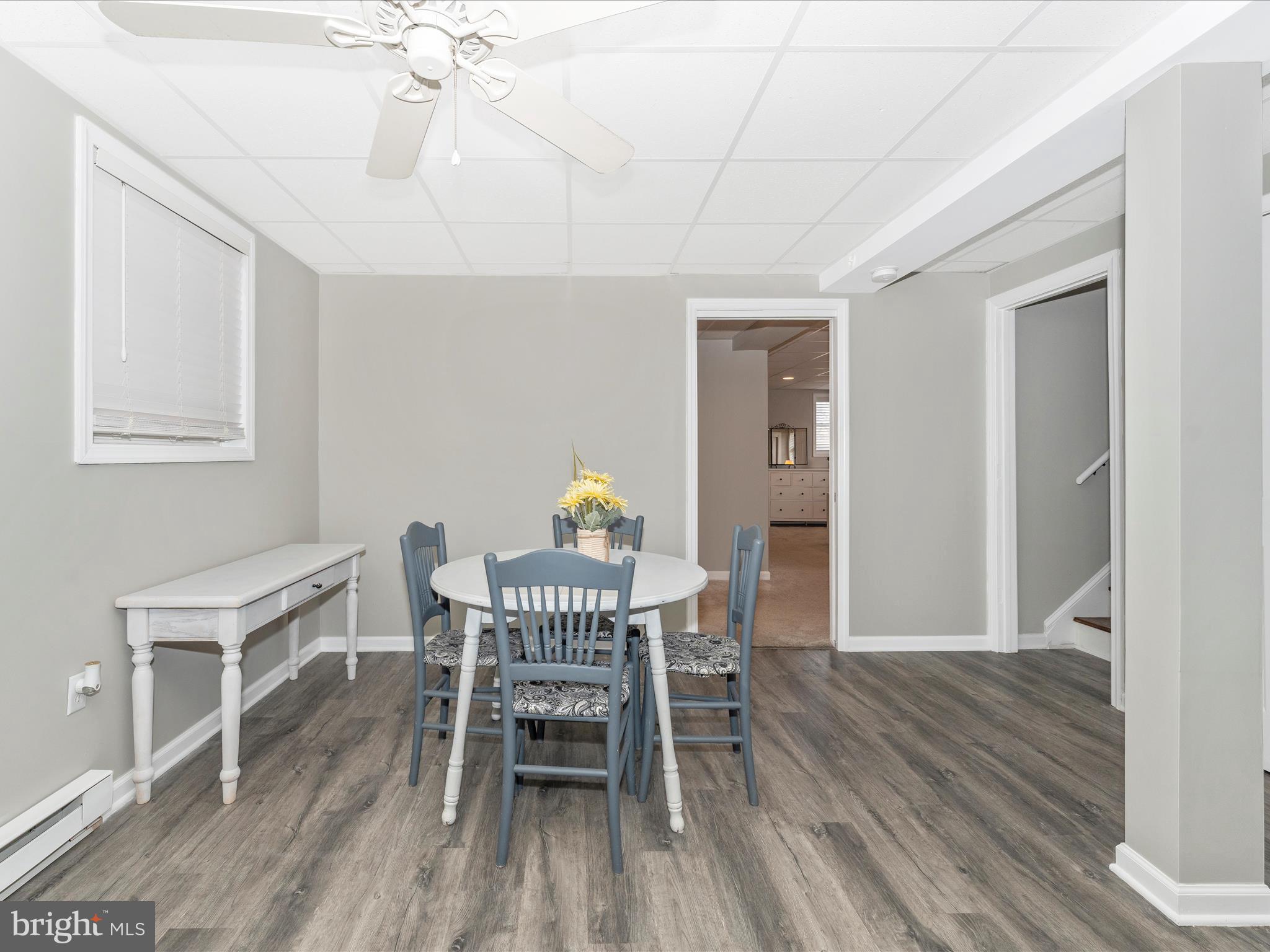 4328 Dover Drive Frederick, MD 21703 - Photo 28 of 54 a view of a dining room with furniture and wooden floor