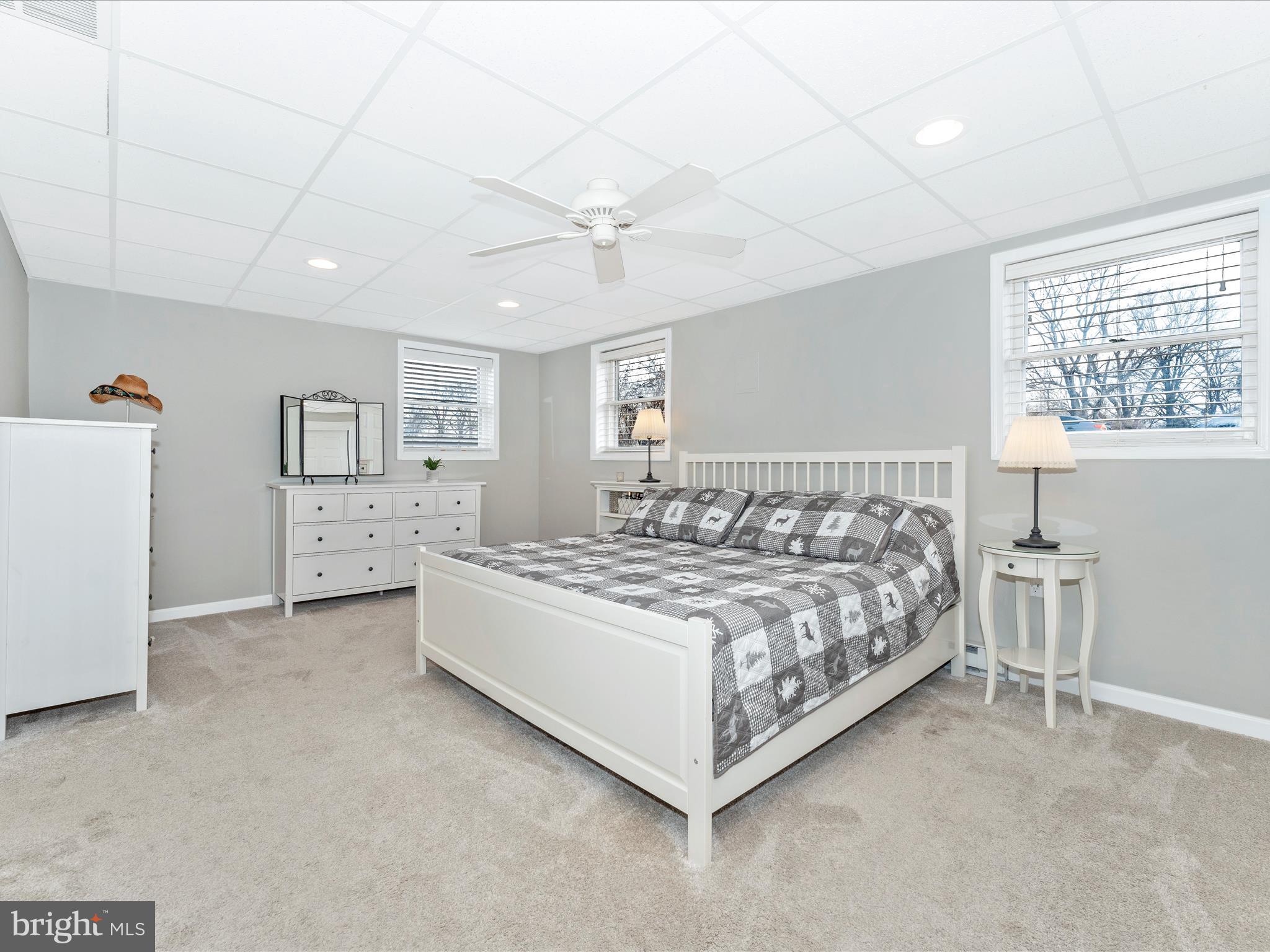 4328 Dover Drive Frederick, MD 21703 - Photo 29 of 54 a spacious bedroom with a bed and a cabinets