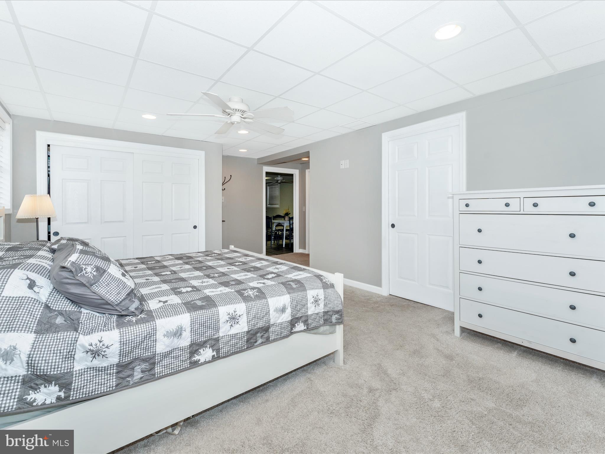 4328 Dover Drive Frederick, MD 21703 - Photo 31 of 54 a spacious bedroom with a bed and a dresser