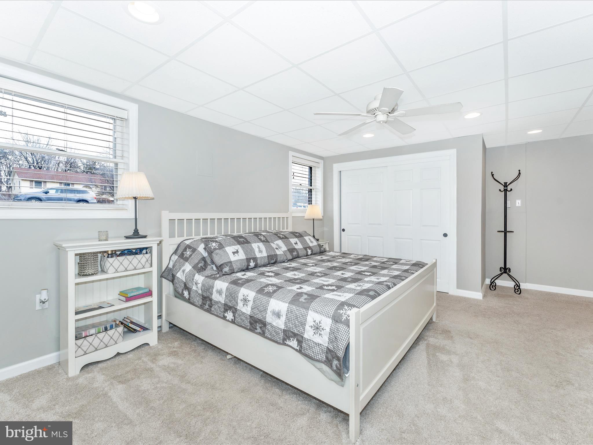 4328 Dover Drive Frederick, MD 21703 - Photo 32 of 54 a bedroom with a bed and a ceiling fan