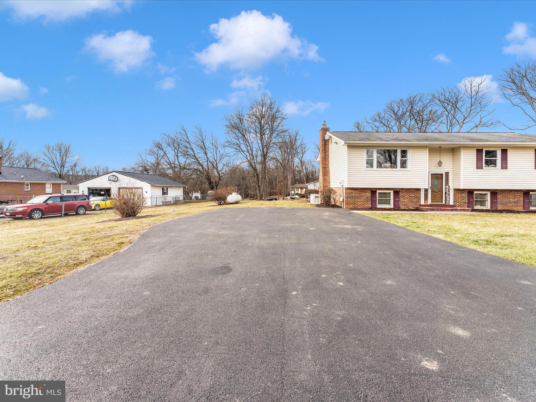 4328 Dover Drive Frederick, MD 21703 - Photo 37 of 54 a view of houses with a outdoor space