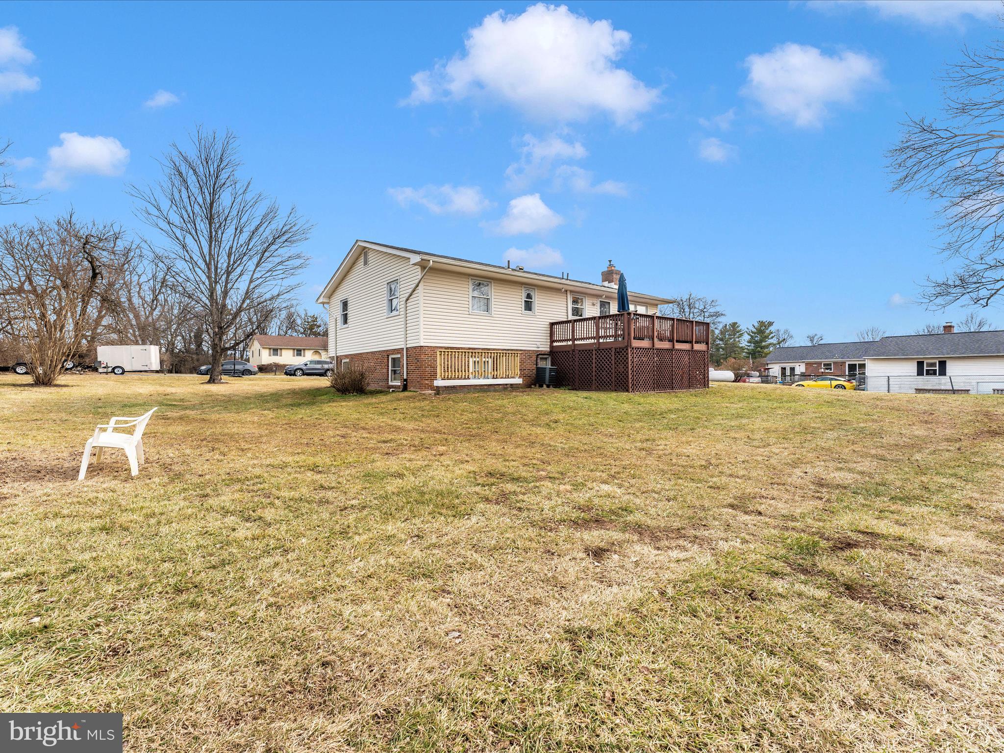 4328 Dover Drive Frederick, MD 21703 - Photo 40 of 54 a view of a house with a yard
