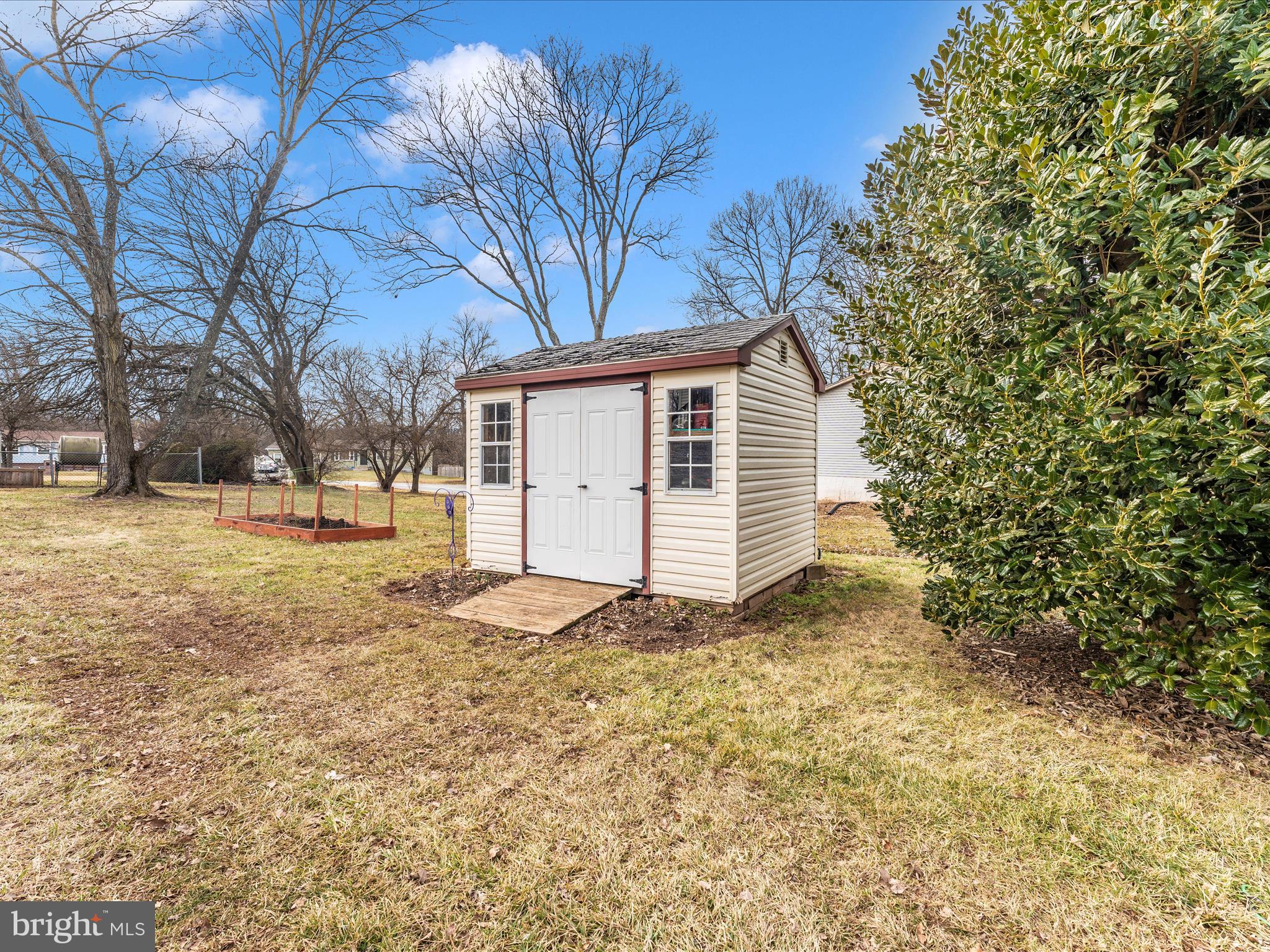 4328 Dover Drive Frederick, MD 21703 - Photo 47 of 54 a view of a house with a yard