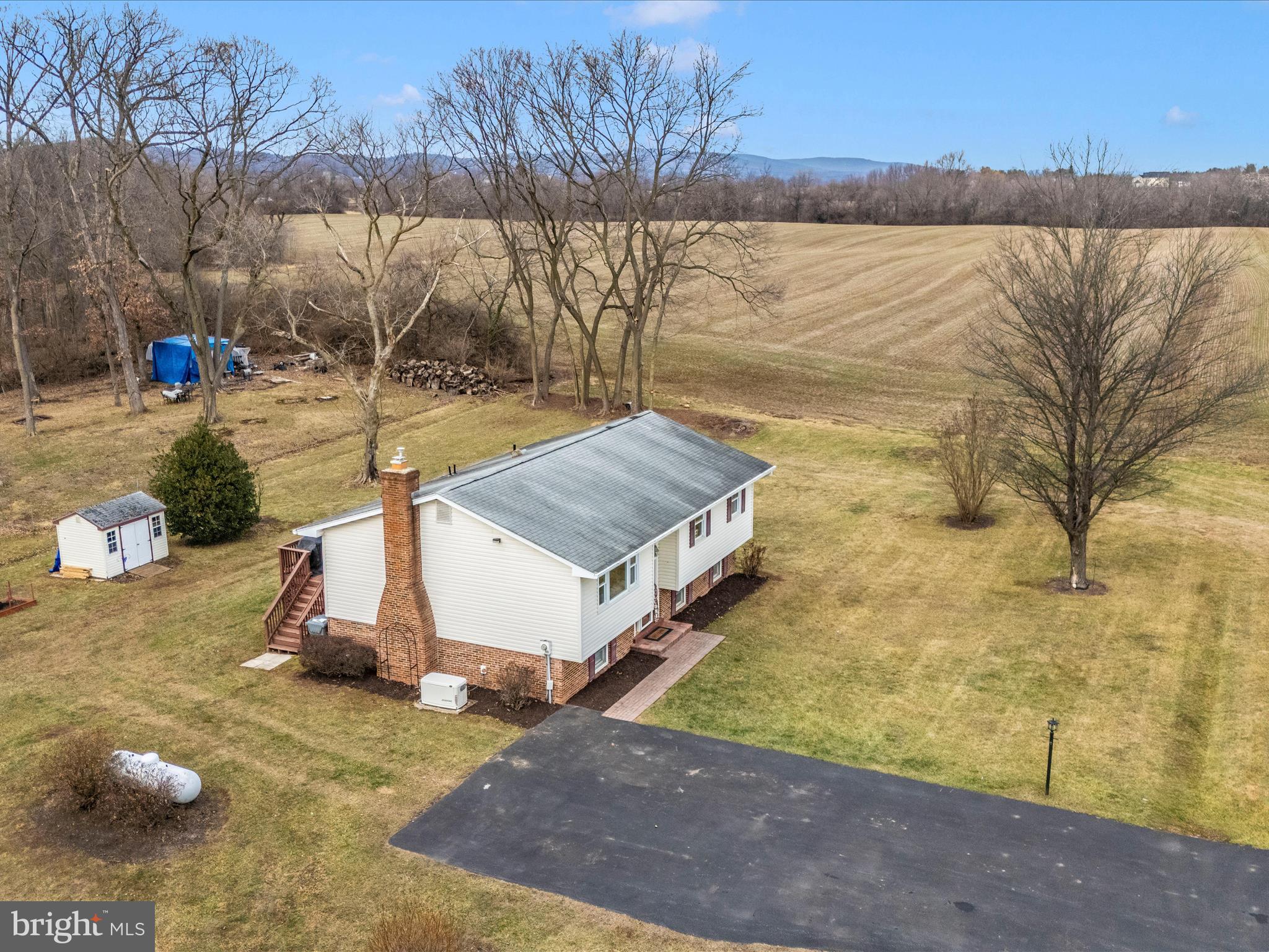 4328 Dover Drive Frederick, MD 21703 - Photo 48 of 54 a view of a lake with a mountain in the background