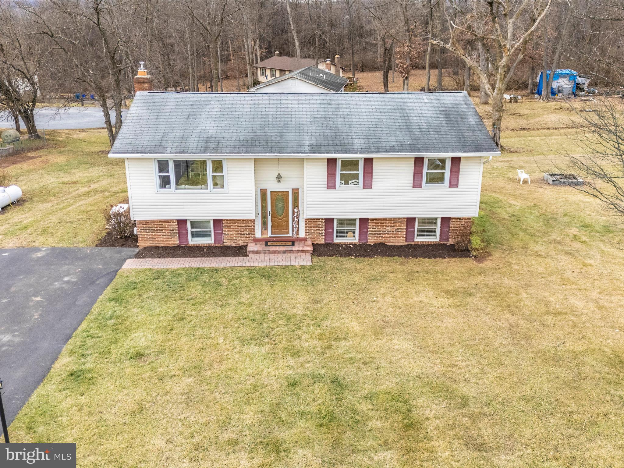 4328 Dover Drive Frederick, MD 21703 - Photo 50 of 54 a aerial view of a house with swimming pool and a yard