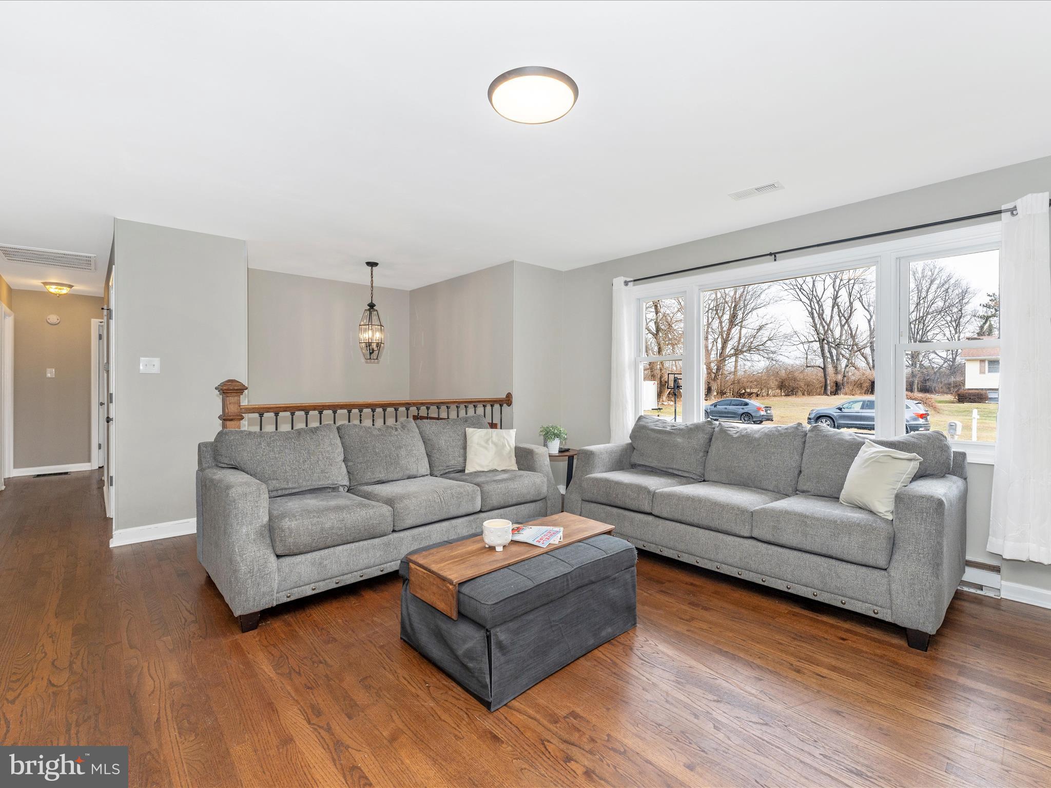 4328 Dover Drive Frederick, MD 21703 - Photo 6 of 54 a living room with furniture and a large window