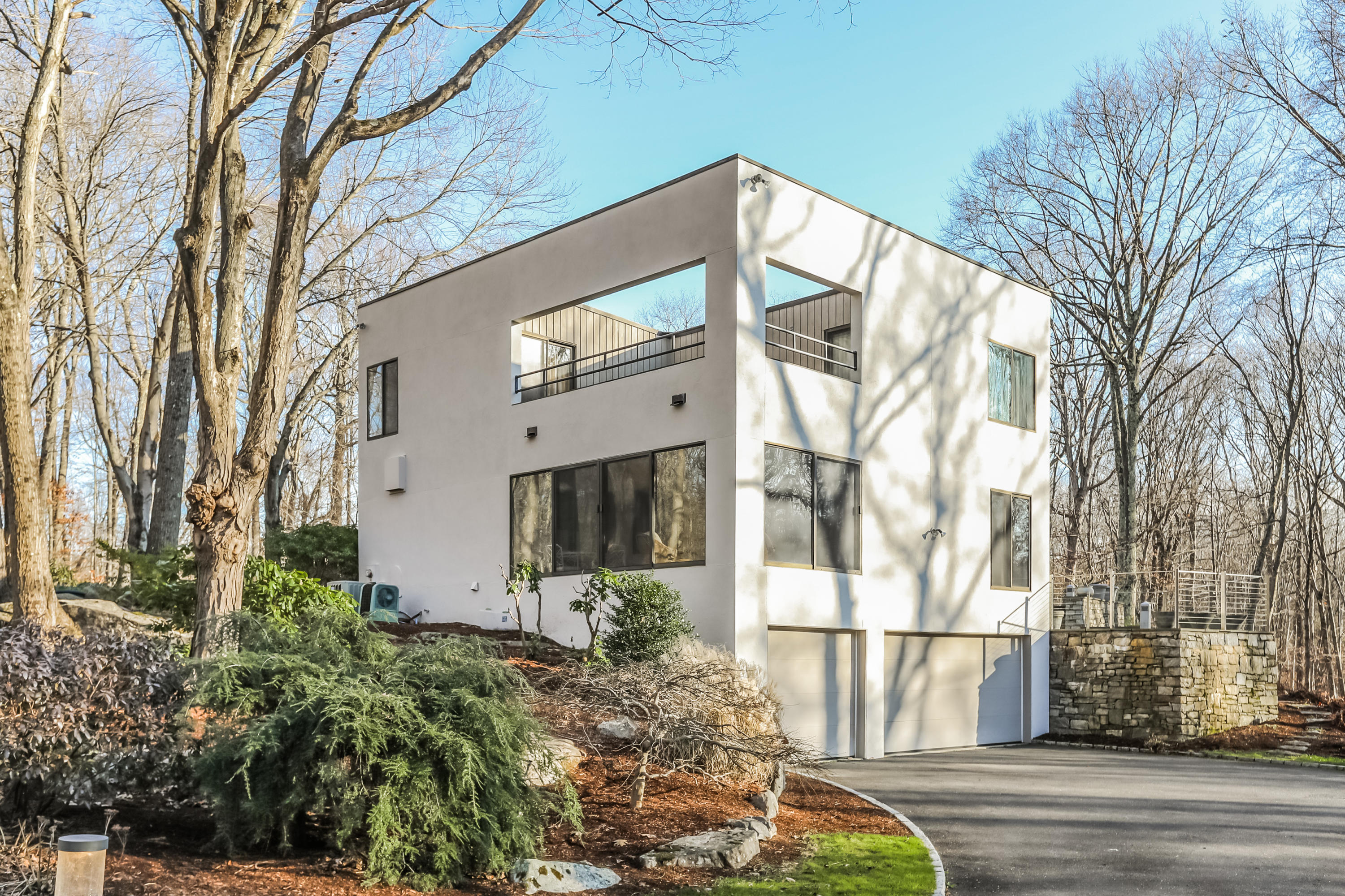50 Marvin Ridge Place Wilton, CT 06897 - Photo 2 of 32 a front view of a house with a yard
