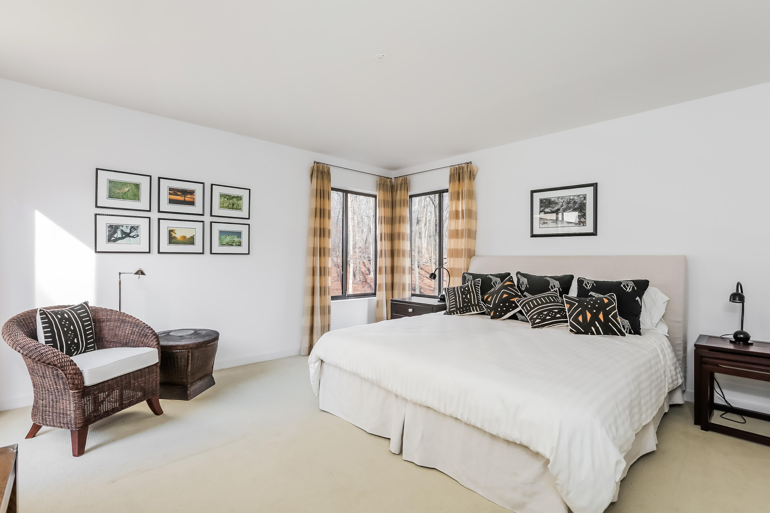 50 Marvin Ridge Place Wilton, CT 06897 - Photo 20 of 32 a spacious bedroom with a bed and a couch