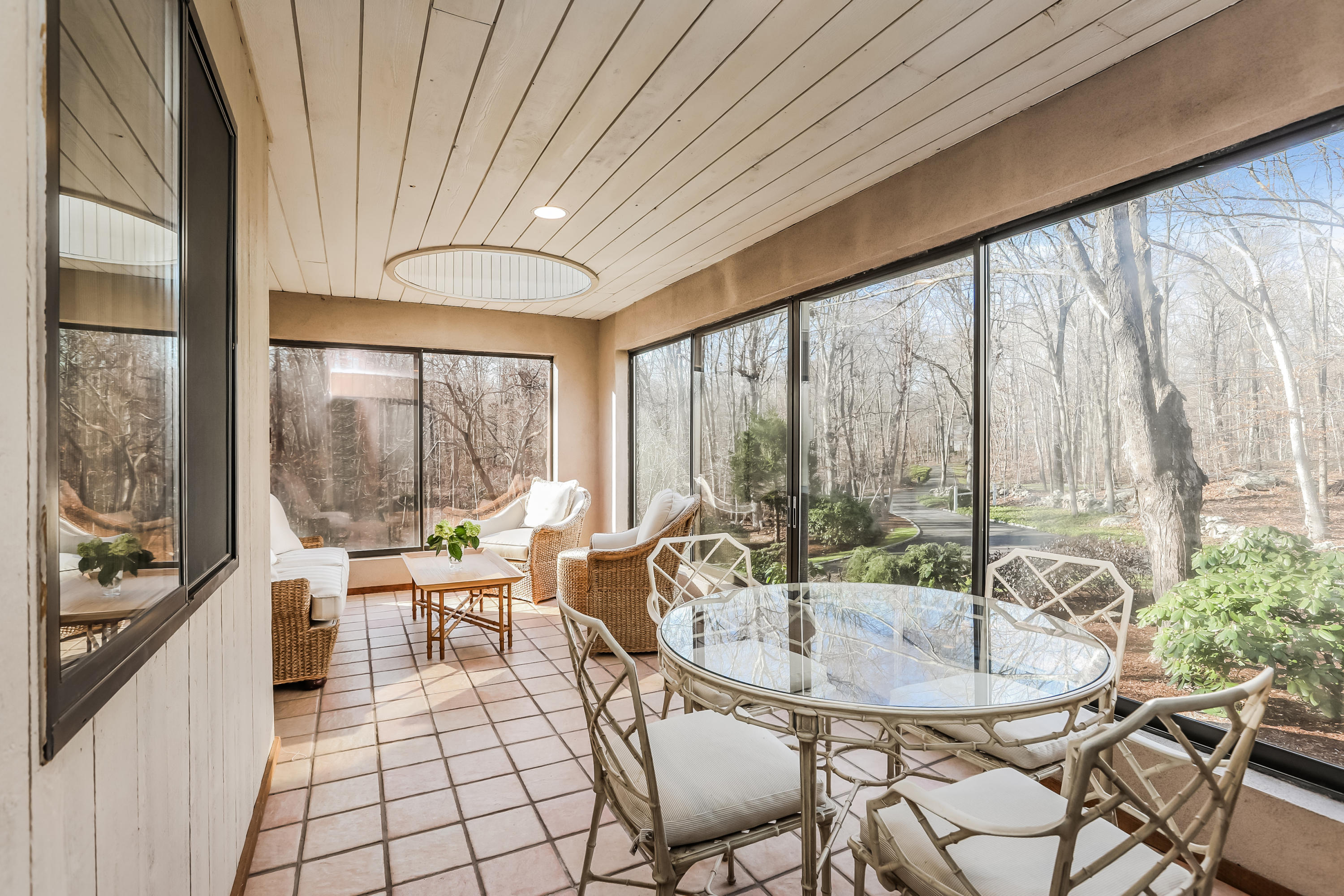 50 Marvin Ridge Place Wilton, CT 06897 - Photo 23 of 32 a dining room with furniture and large windows