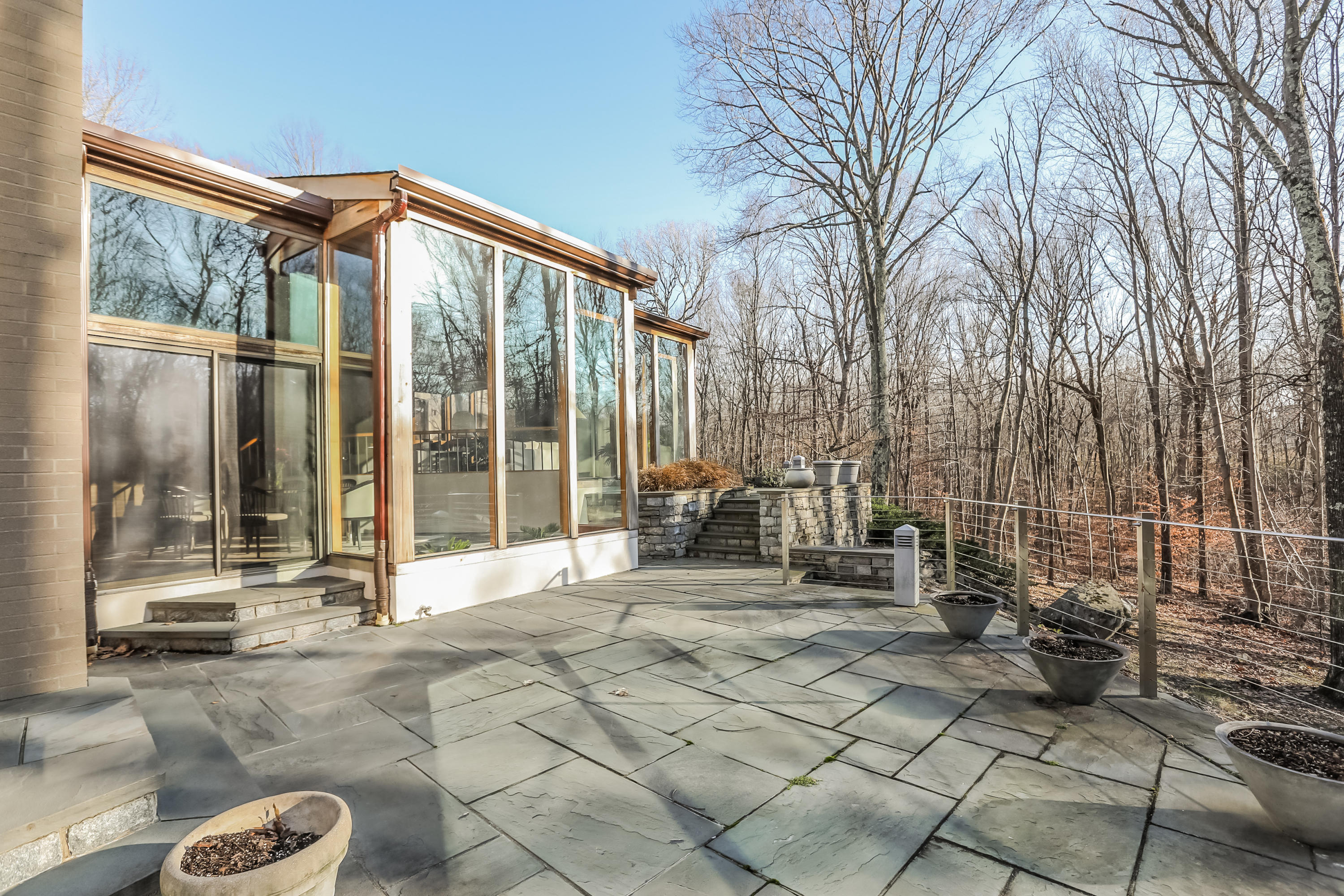 50 Marvin Ridge Place Wilton, CT 06897 - Photo 24 of 32 a backyard of a house with seating space