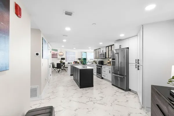 a kitchen with a large window
