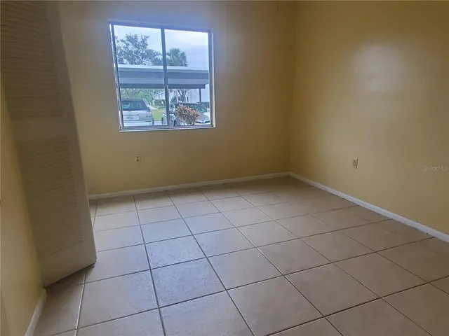 an empty room with a window