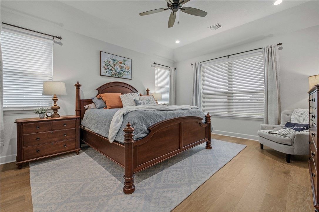 4309 Batona Court Bryan, TX 77802 - Photo 16 of 27 a bedroom with a bed and a window