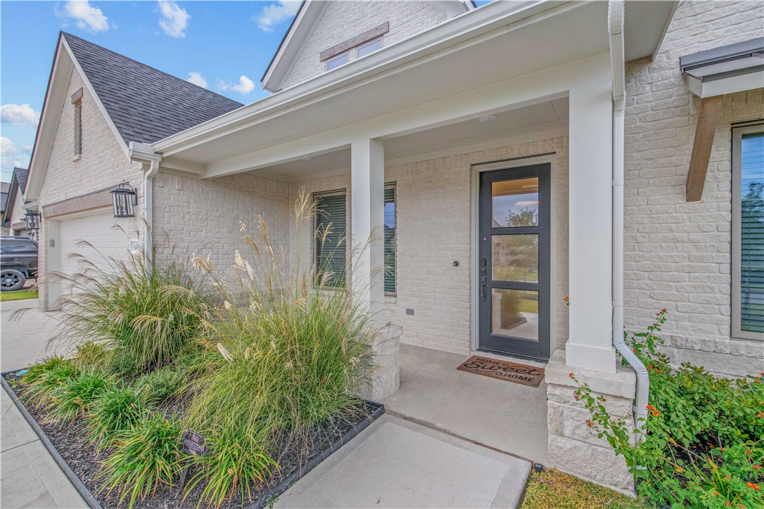 4309 Batona Court Bryan, TX 77802 - Photo 2 of 27 front view of a house with a yard