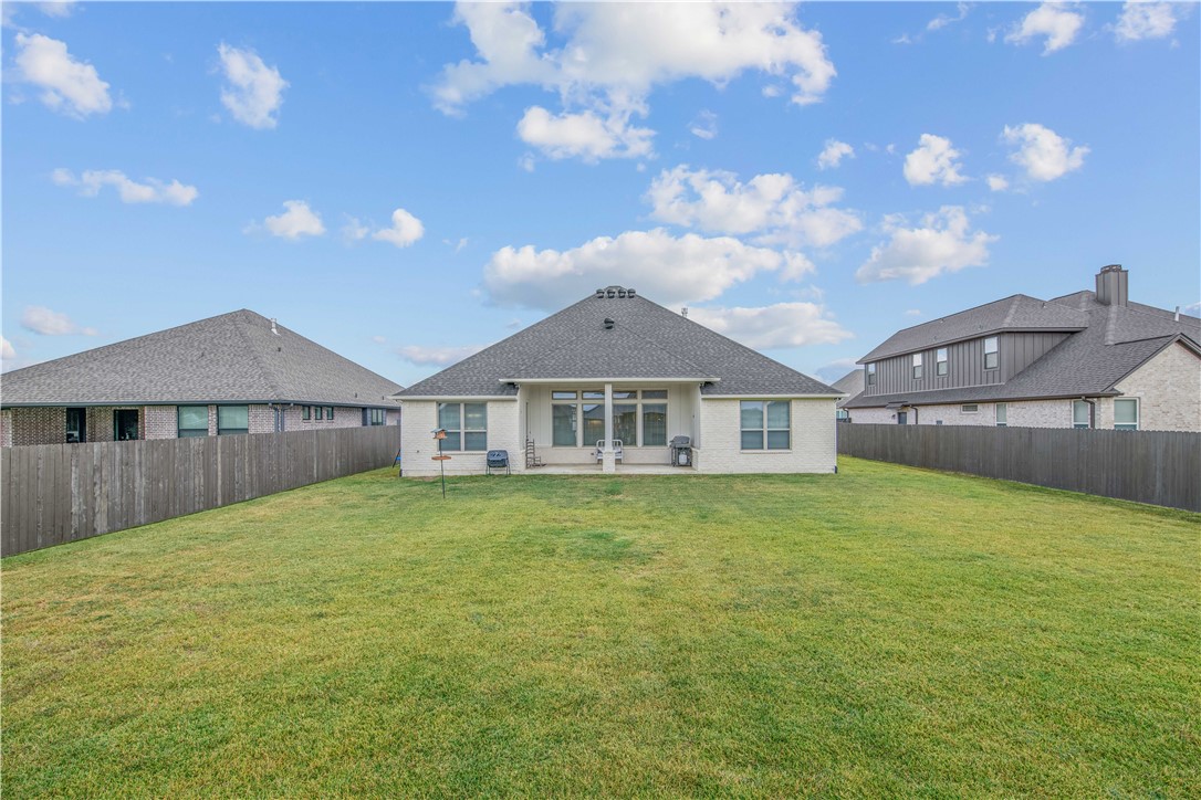 4309 Batona Court Bryan, TX 77802 - Photo 27 of 27 a front of a house with a garden