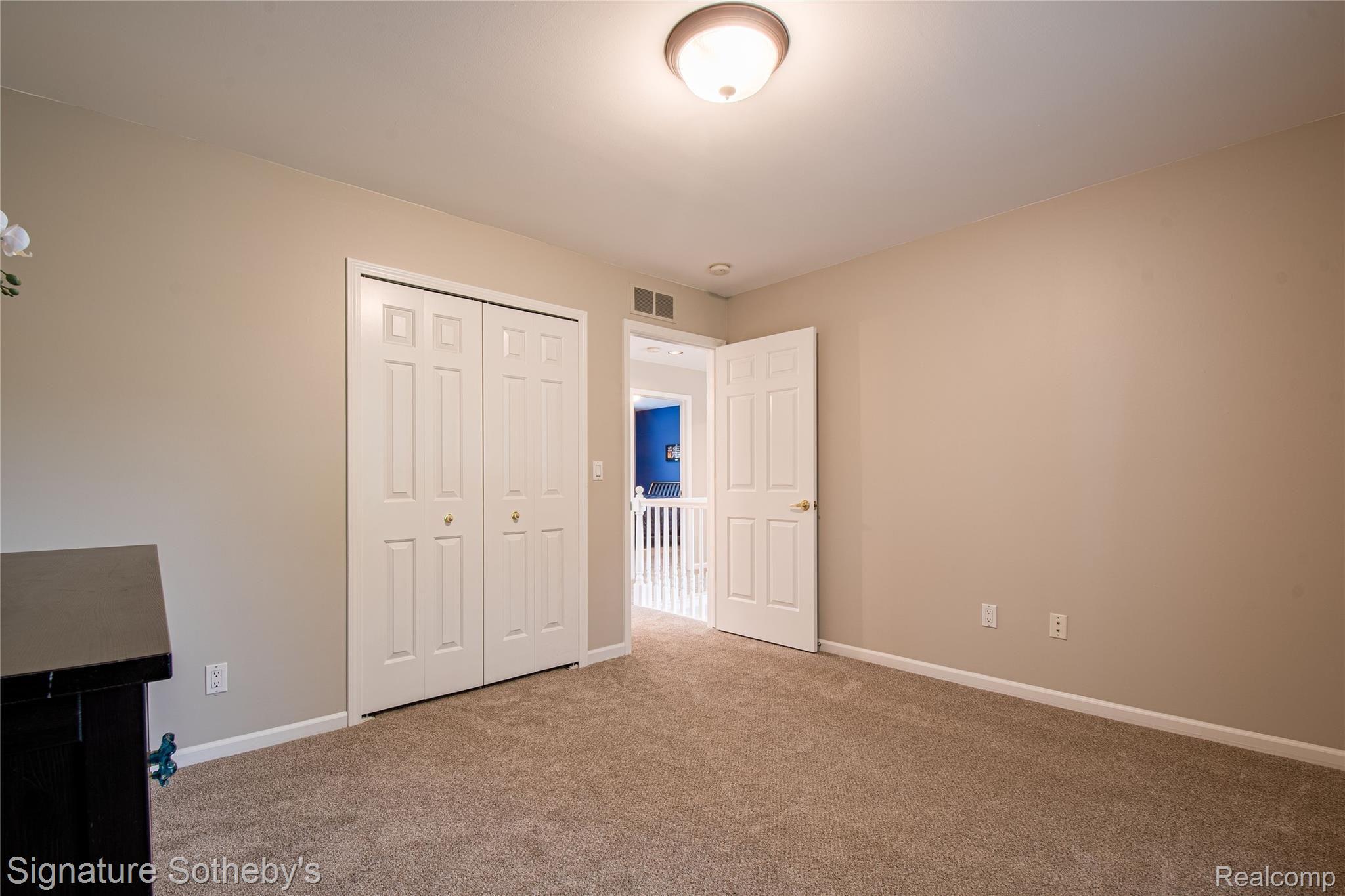 745 West Ridge Court Lake Orion, MI 48359 - Photo 28 of 44 Bedroom two upstairs
