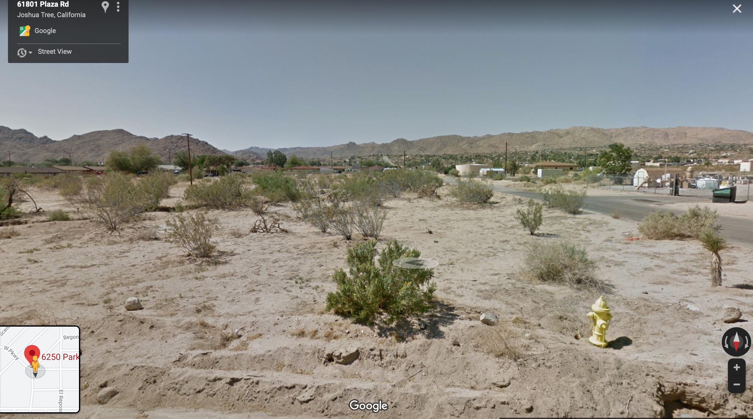 61803 Plaza Road Joshua Tree, CA 92252 - Photo 18 of 26 a view of lake with mountain