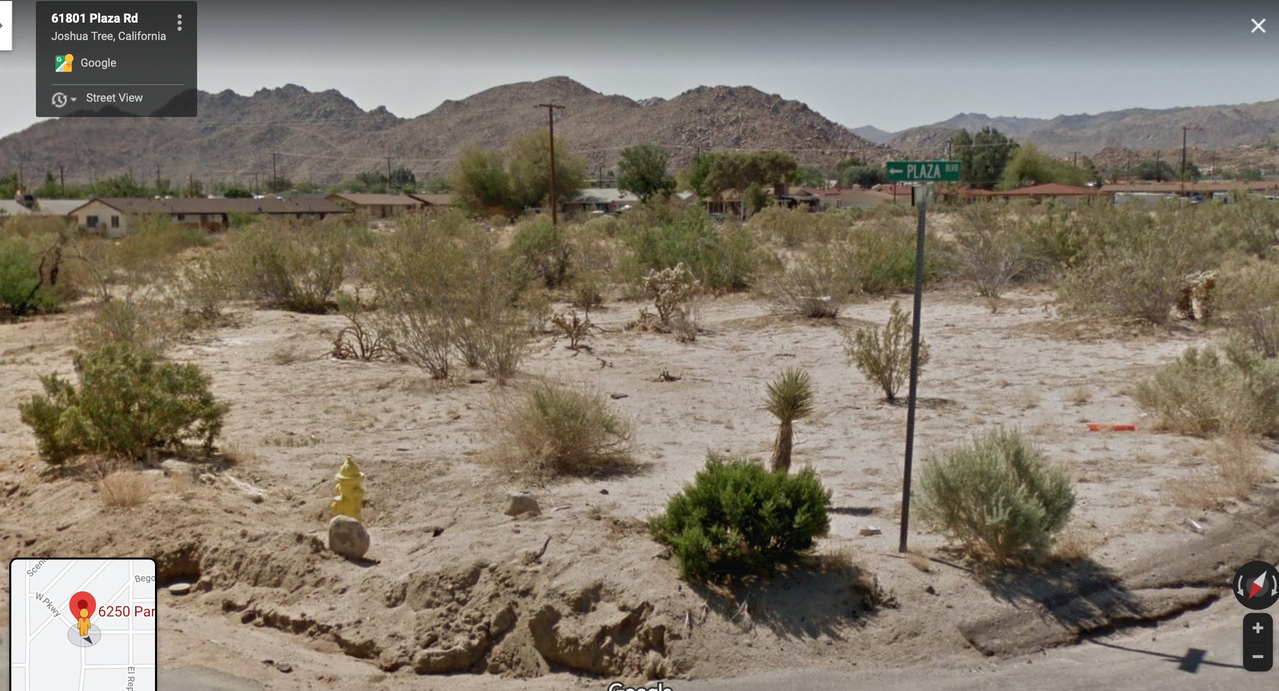 61803 Plaza Road Joshua Tree, CA 92252 - Photo 10 of 26 a view of a lake in middle of forest