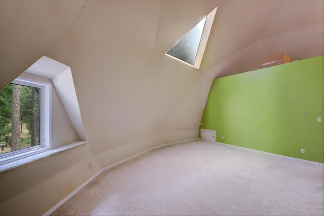 a view of a house with a tree