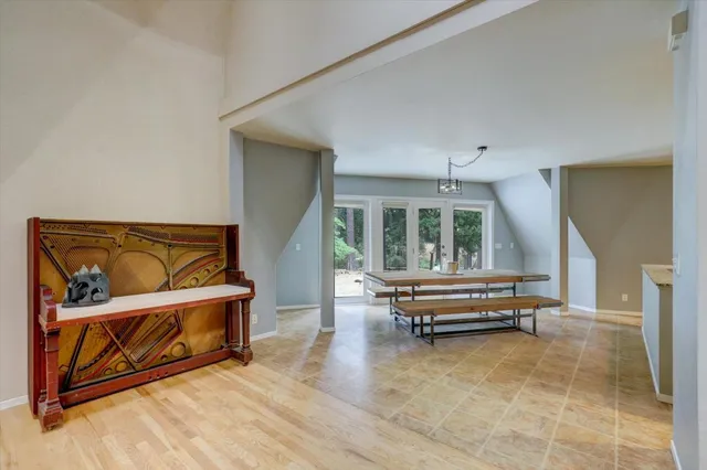 a view of a livingroom with furniture and window