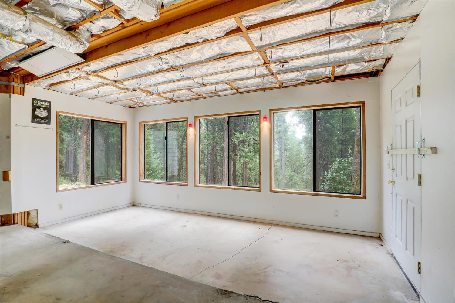 18125 Douglas Road Nevada City, CA 95959 - Photo 34 of 48 a view of a large room with a large window