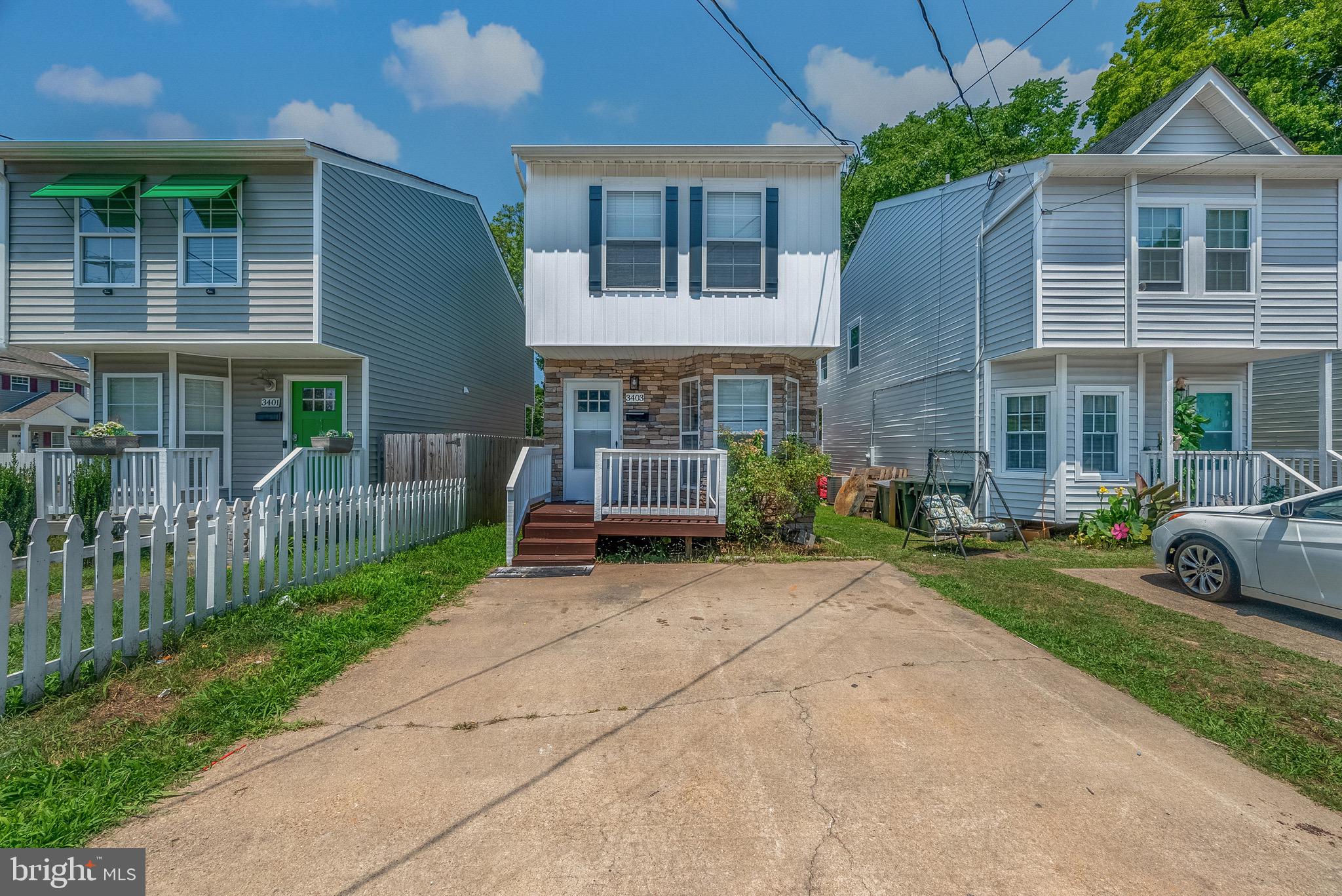 3403 Shell Road Hampton, VA 23661 - Photo 1 of 12 front view of a house with a yard