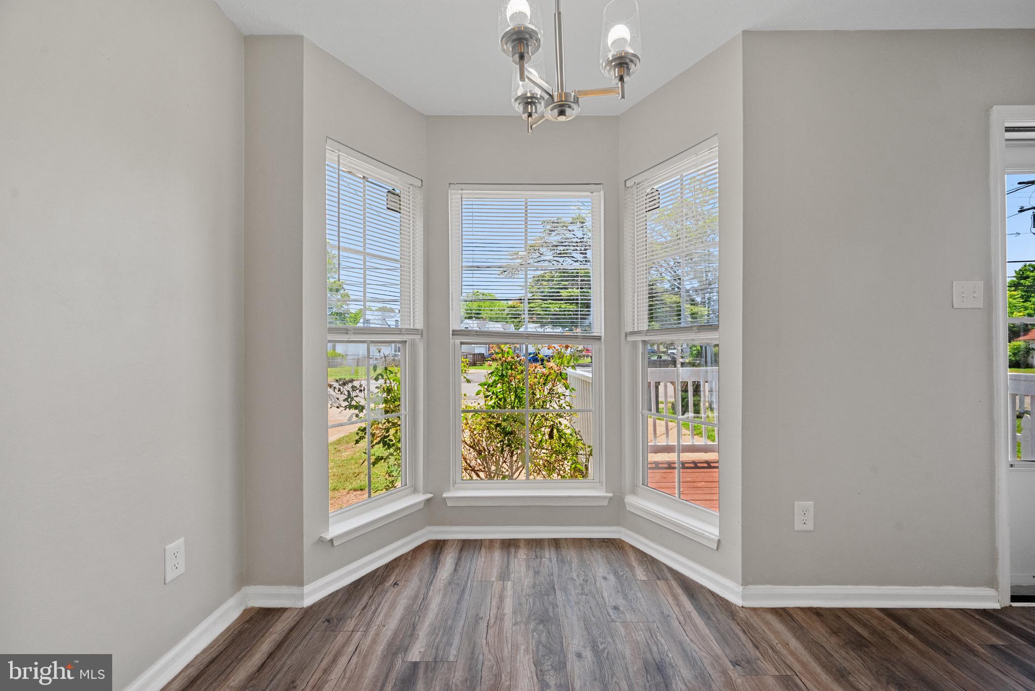 3403 Shell Road Hampton, VA 23661 - Photo 2 of 12 a view of room with window and hardwood floor