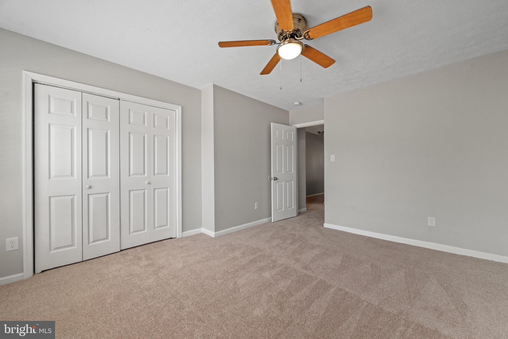 3403 Shell Road Hampton, VA 23661 - Photo 9 of 12 an empty room with chandelier fan
