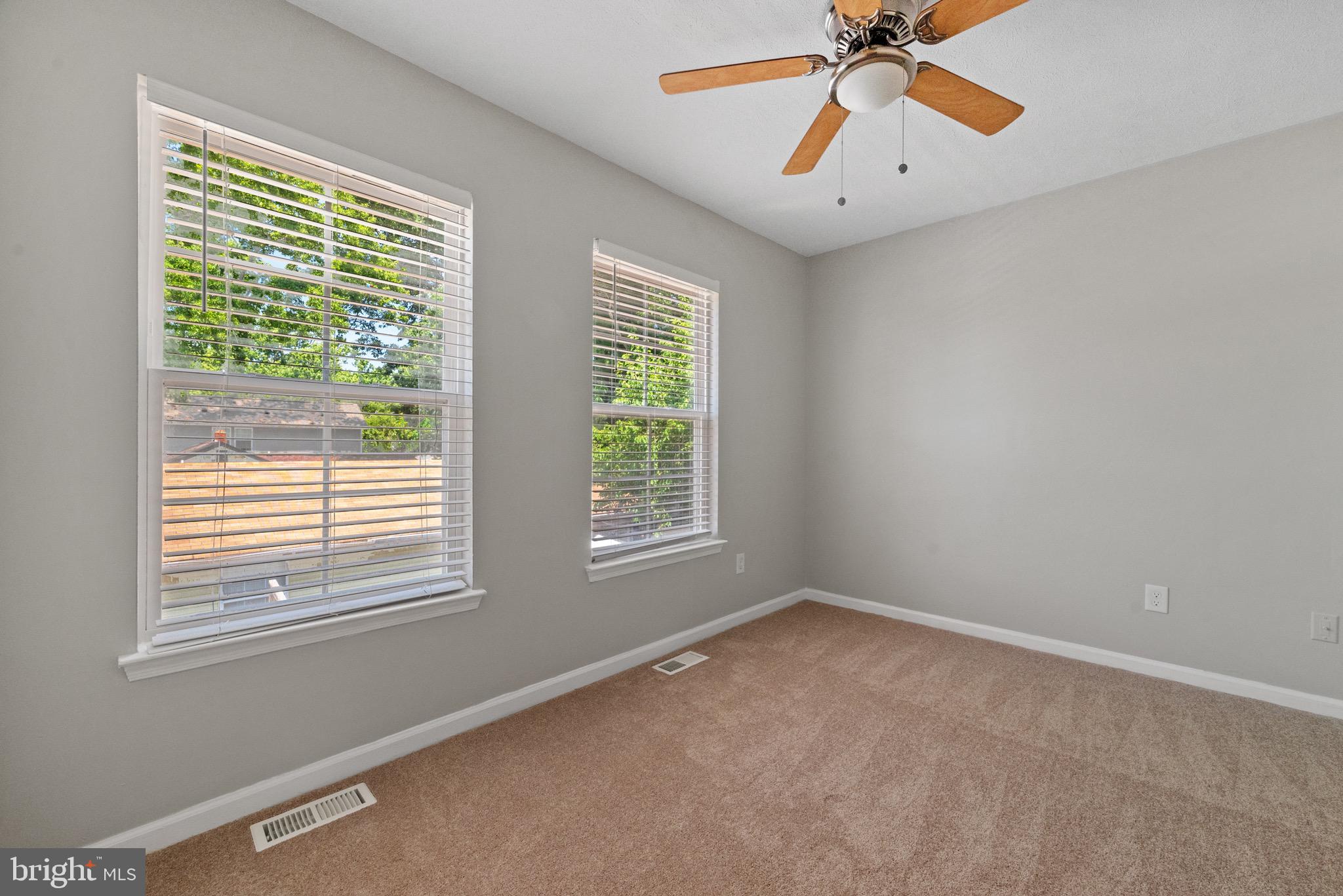 3403 Shell Road Hampton, VA 23661 - Photo 10 of 12 a view of an empty room with a window
