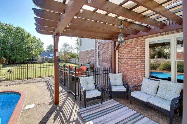 a view of a porch with furniture
