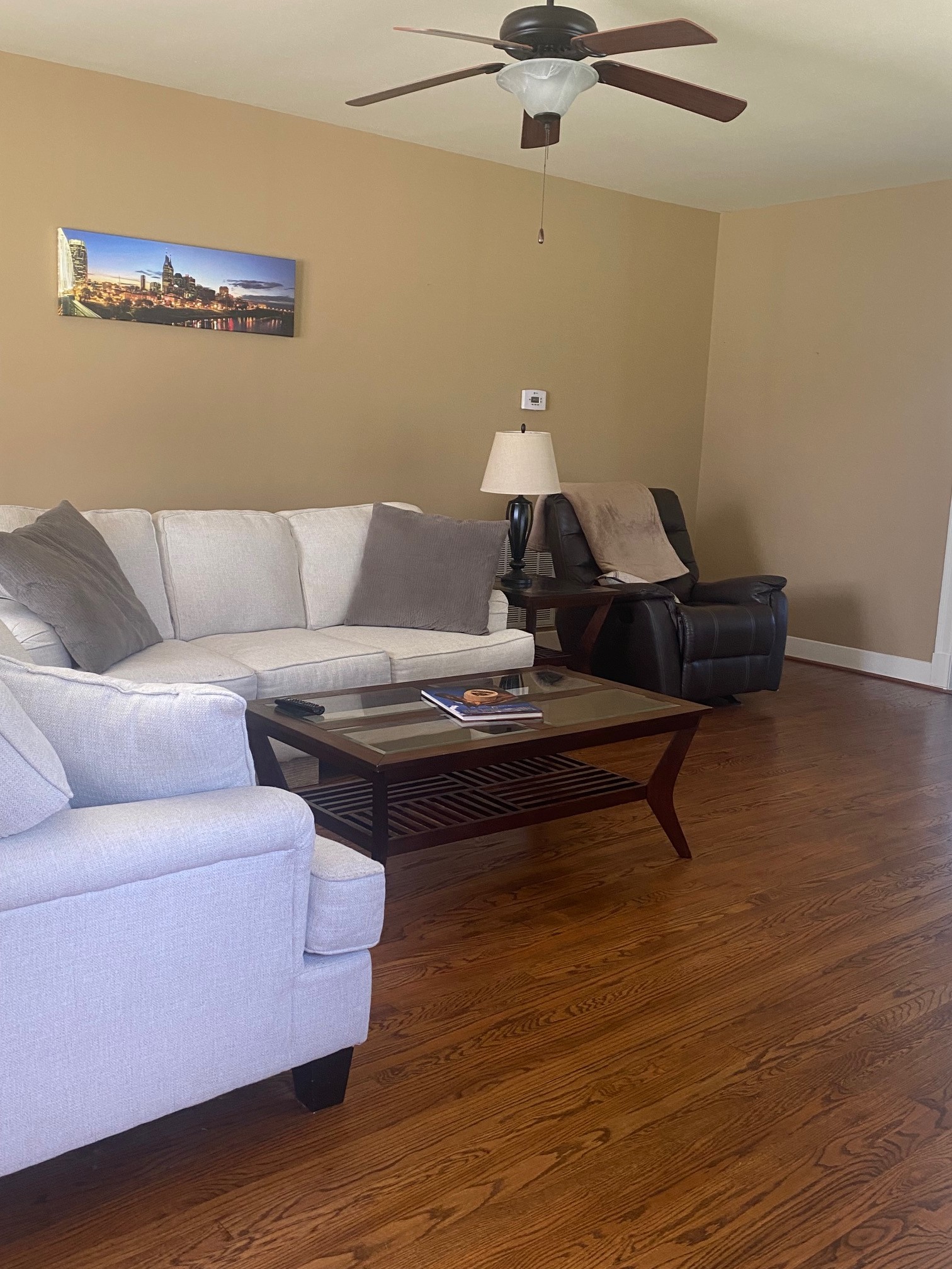 311 Main Street Martin, TN 38237 - Photo 13 of 49 a living room with furniture and a wooden floor