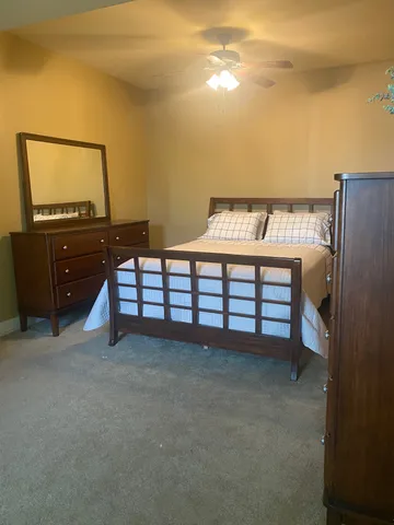 a view of a room with a bunk bed