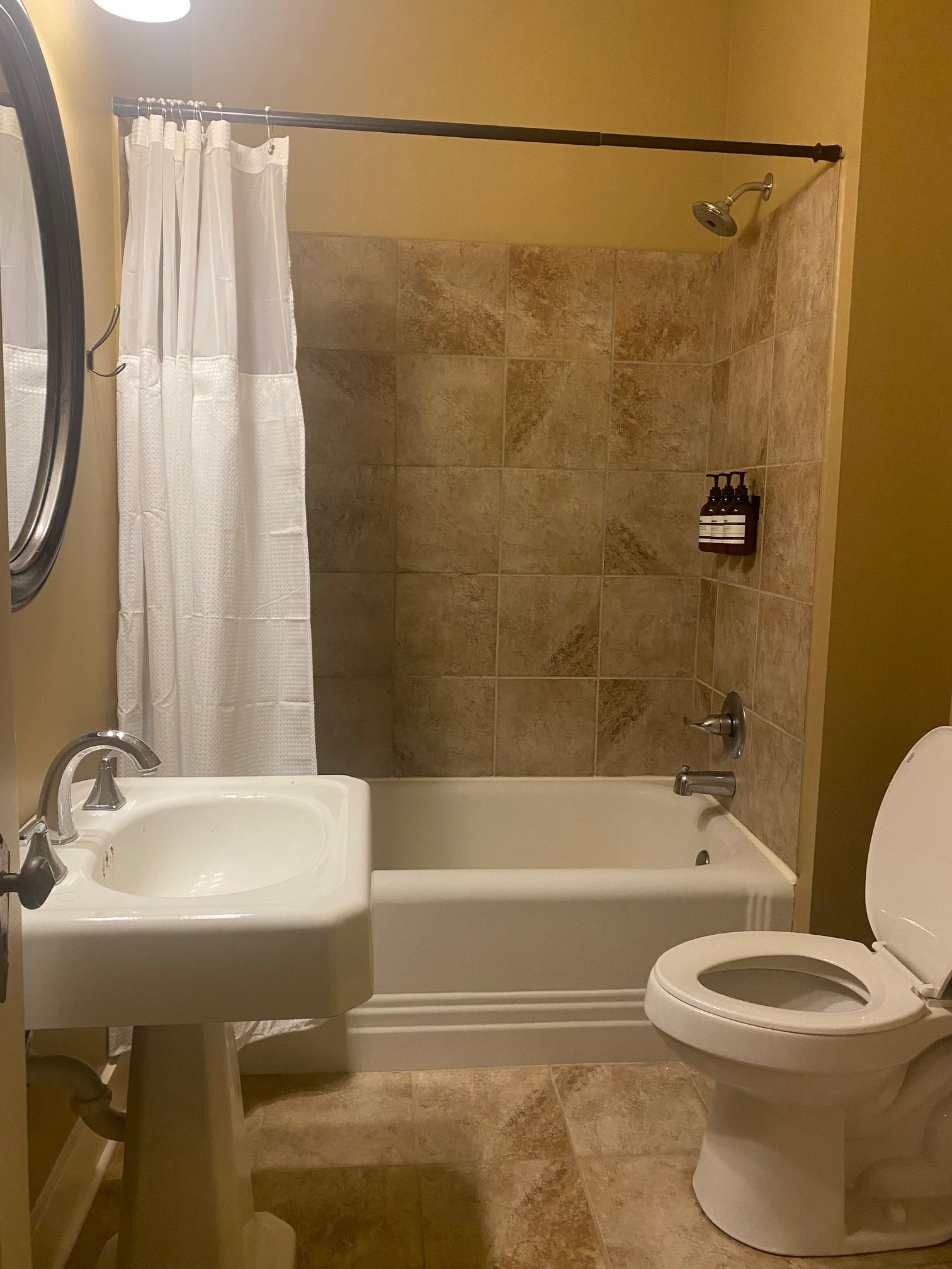311 Main Street Martin, TN 38237 - Photo 25 of 49 a bathroom with a sink a toilet and a bathtub