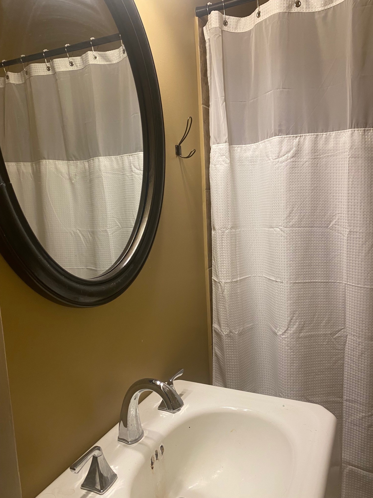 311 Main Street Martin, TN 38237 - Photo 26 of 49 a bathroom with a sink and a mirror