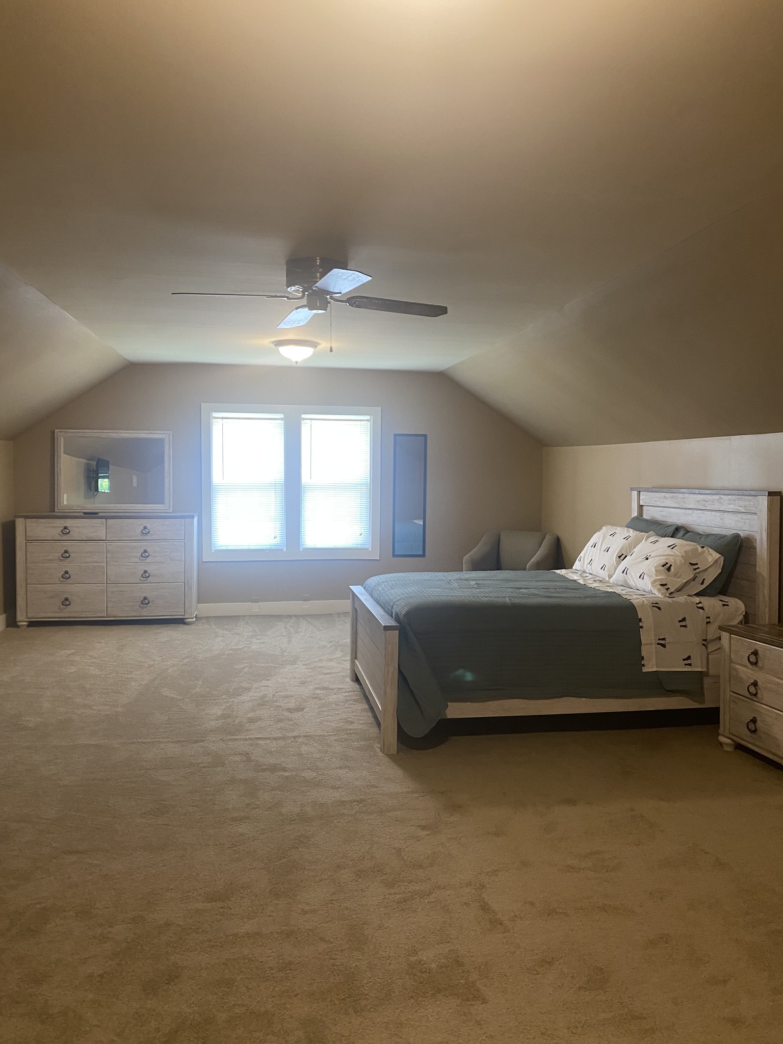 311 Main Street Martin, TN 38237 - Photo 33 of 49 a spacious bedroom with a bed and window