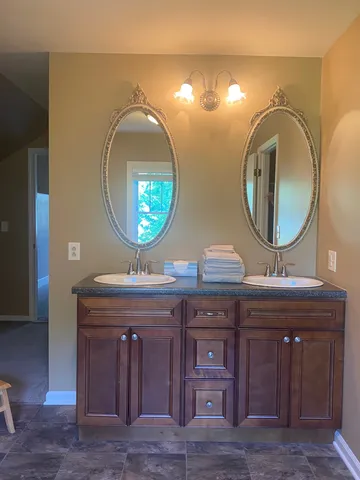 a bathroom with a bath tub