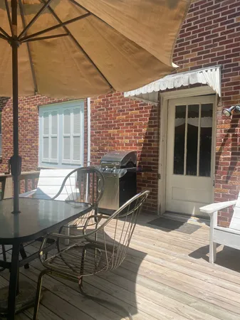 a view of a dinning tables and chairs in patio