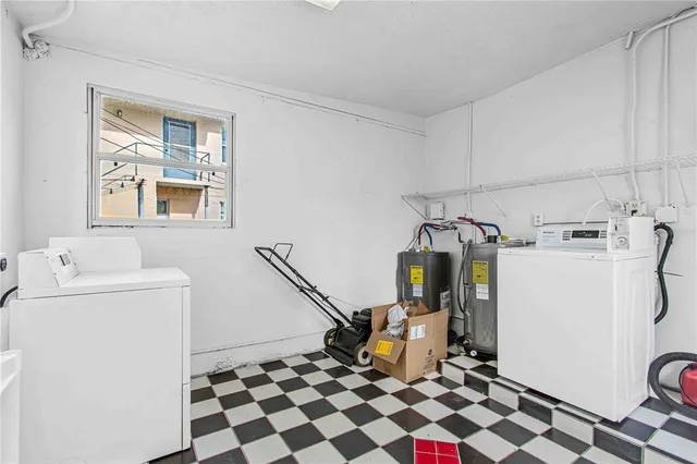 a view of a storage & utility room with a window