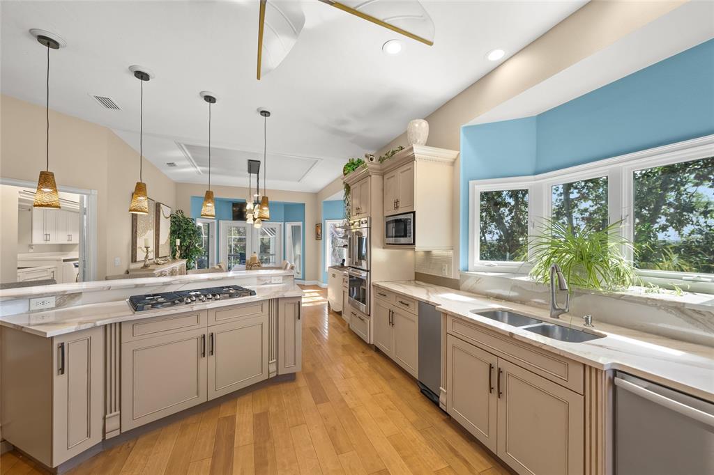 746 Eagle Point Drive Venice, FL 34285 - Photo 14 of 50 a large kitchen with a large window